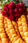 India, West Bengal, Kolkata. Marigolds strung into ropes for necklaces an offerings. Art Print